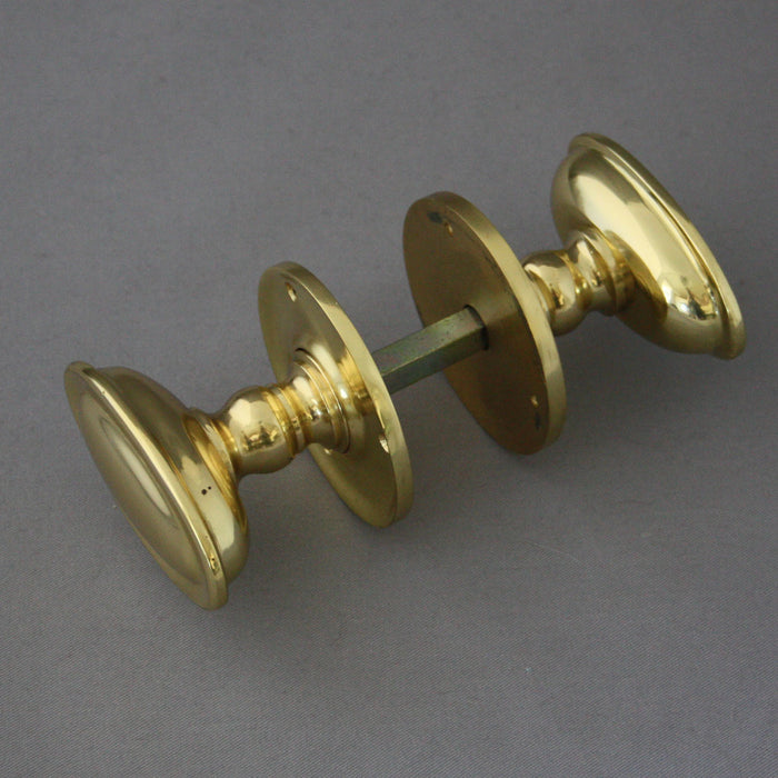 Oval brass door handles