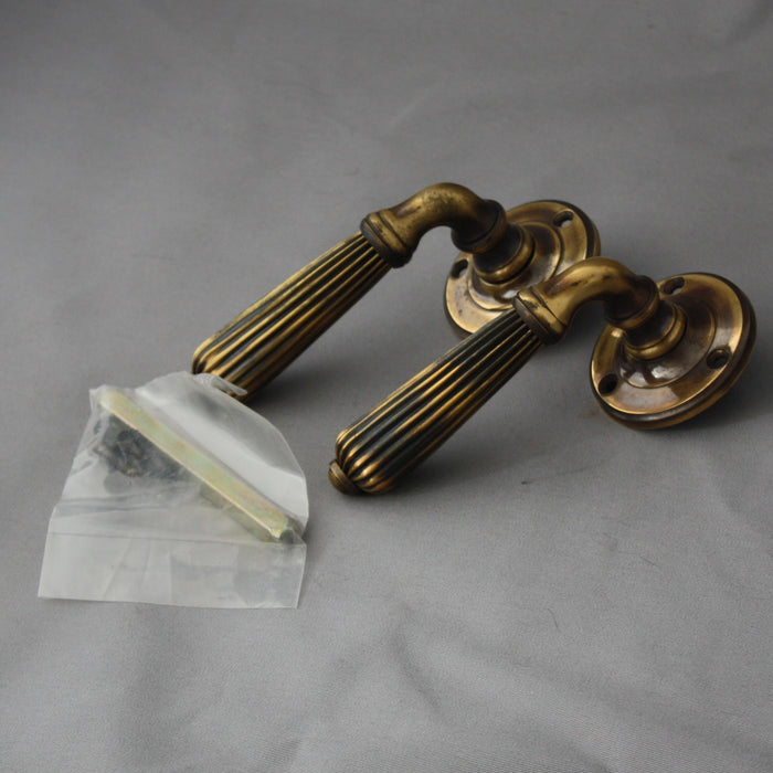 Antique reeded brass lever handles