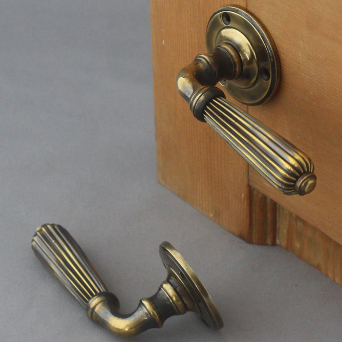 Period brass lever door handles